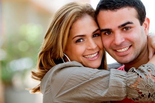 A Couple smiling after dental implant in Audubon,NJ.