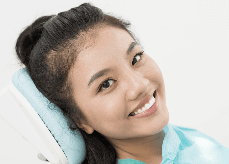 A young woman affordable General Dentistry in Audubon, NJ