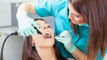 A lady undergoing dental treatment in Audubon, NJ.