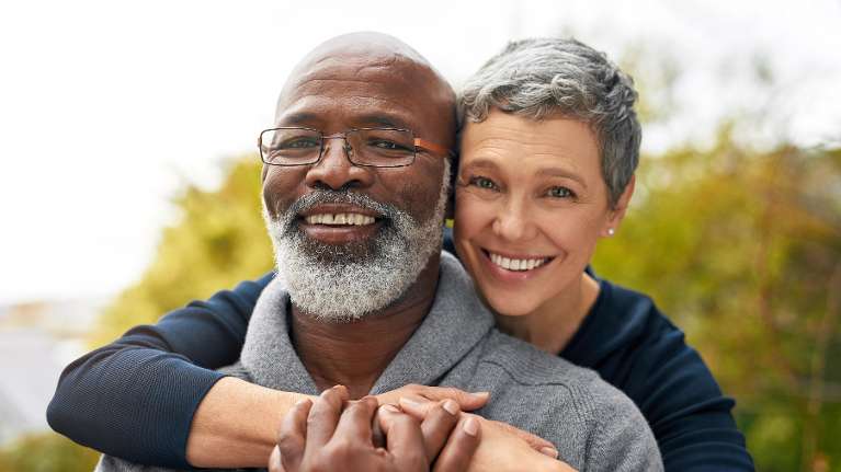 A couple with dental implants in Audubon, NJ 